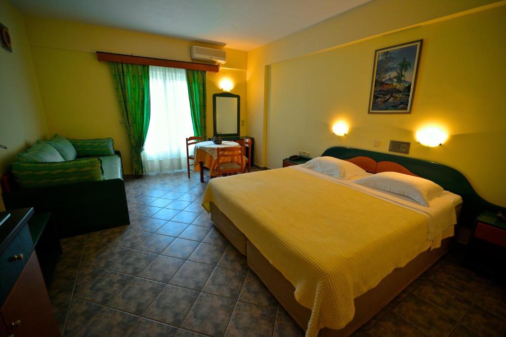 Hotel Odeon Vasilikí Pokoj fotografie